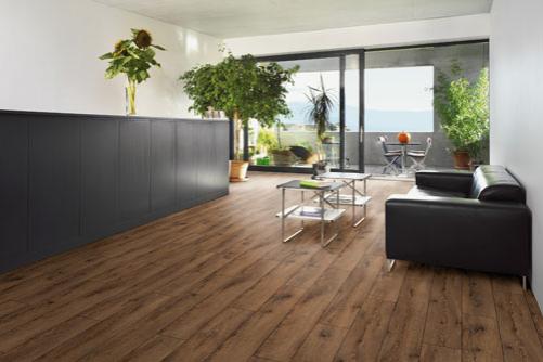 Dark brown laminate wood flooring in a home.
