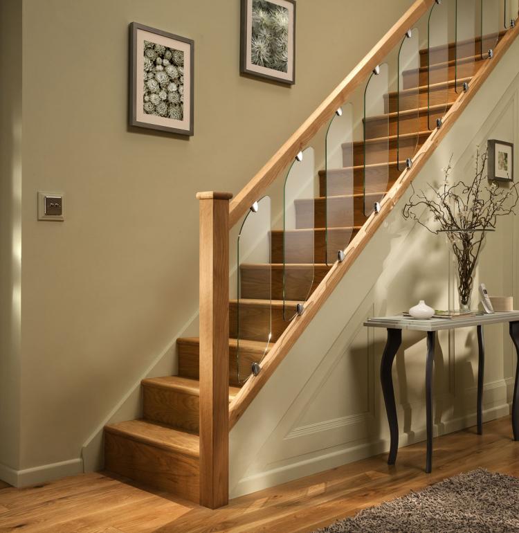 A combination of wood and glass balustrade in a home. The Contemporary Clarity Glass Balustrade is very popular this year.