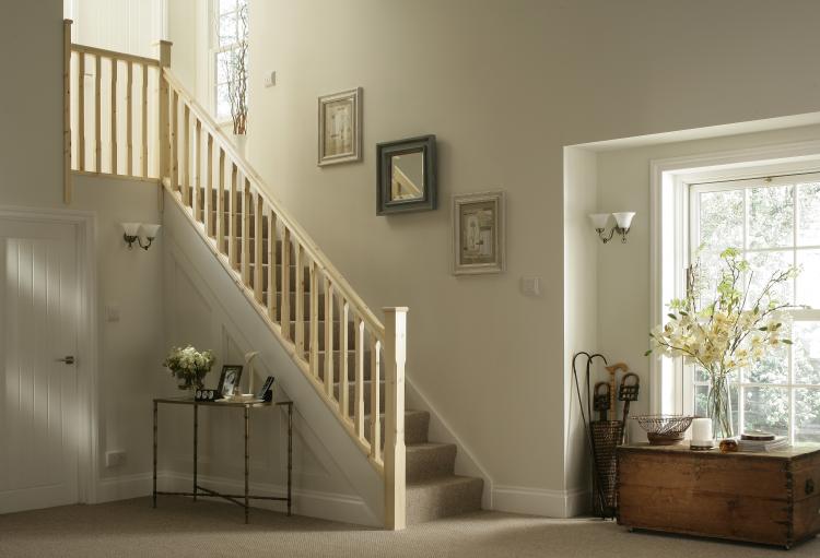 Stop Chamfered range of staircase parts in a home setting. We stock the spindles, newel posts, newel caps, handrails and base rails here on our website.