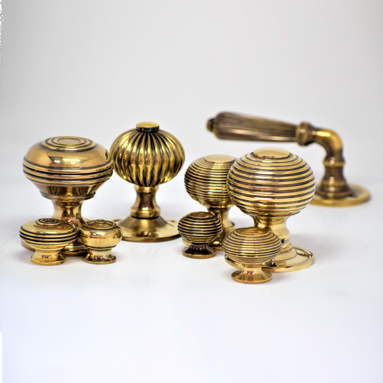 Brass door handles and knobs manufactured by Spira Brass.